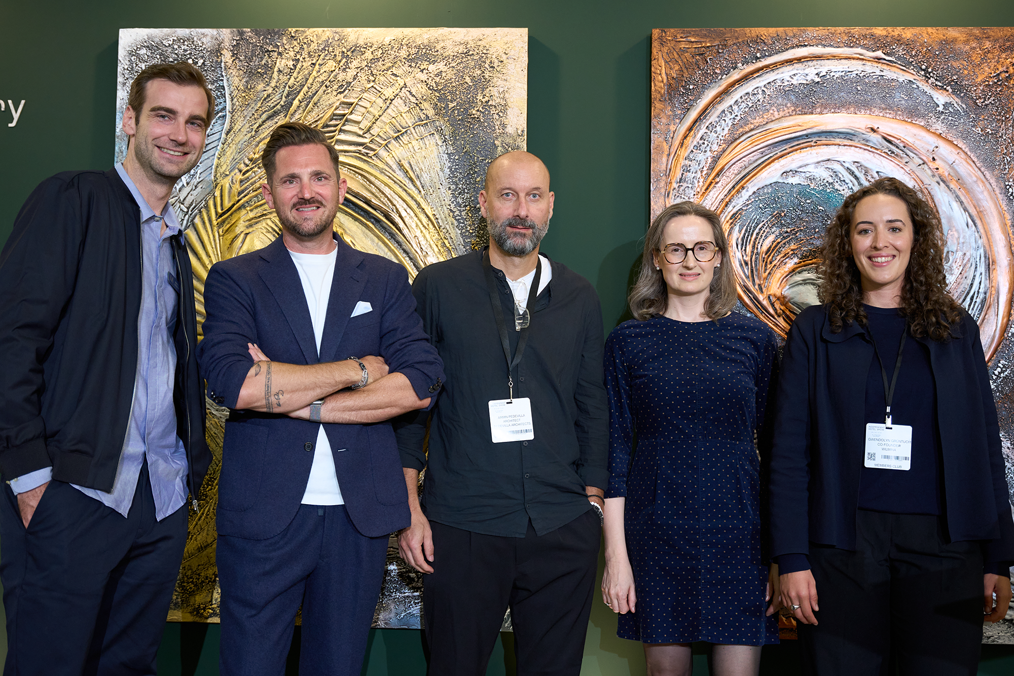 Four awards for independent hospitality: the winners of the Independent Hotel Show Munich Awards 2026 with show director Moritz Schleich. Awards went to Wilmina, Hotel Schani City, Biohotel Bühelwirt and Franz-Josef Perauer.