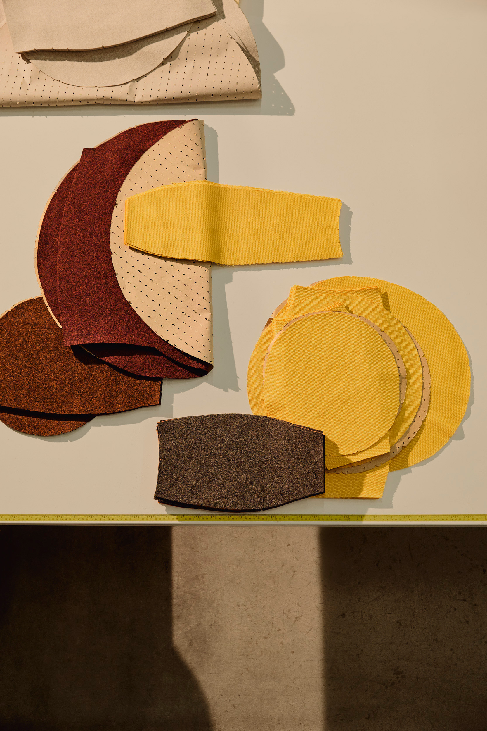 Cut upholstery parts in Arper’s production: comfort begins long before the finished piece of furniture.