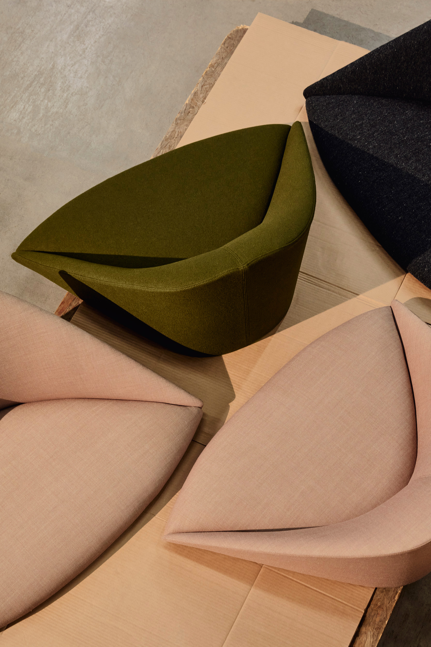 Upholstered seat shells in Arper’s production: the debate about circularity starts before the finished product.